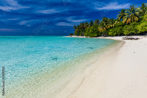 White sandy beach in Maldives with amazing blue lagoon