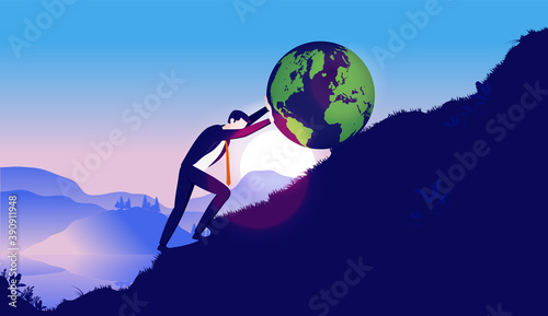 Businessman pushing earth up hill - Man working hard to earth up mountain. Business responsibility and globalization concept.