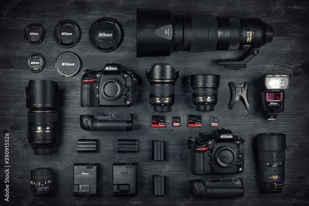 Cagliari, Italy 06/1/2020; Top view of Nikon professional Dslr equipment,  work space photographer with two Nikon D810 and Sandisk Memory Cards. Stock  Photo | Adobe Stock