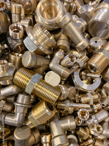 Collected brass scrap bolts and fittings to be recycled