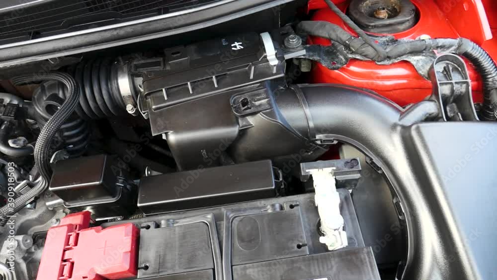 Clean air filtration system of a Nissan pulsar engine deck Clean air filtration system of a Nissan pulsar engine deck