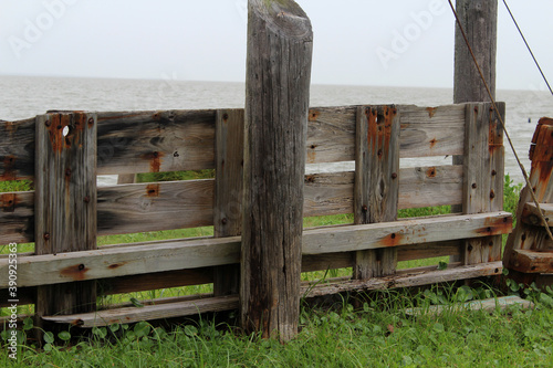 old wooden fence on the beach