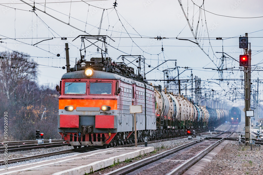 Freight train moves on the station.