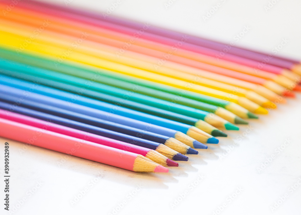 Rainbow colored pencils on white Rainbow colored pencils on white