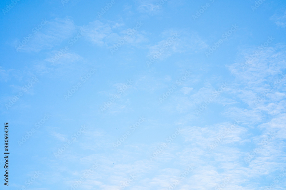 Blue sky against tiny cloud sky background.