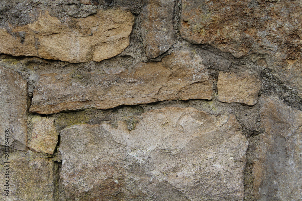 Fototapeta premium Unregelmäßige Natursteinmauer