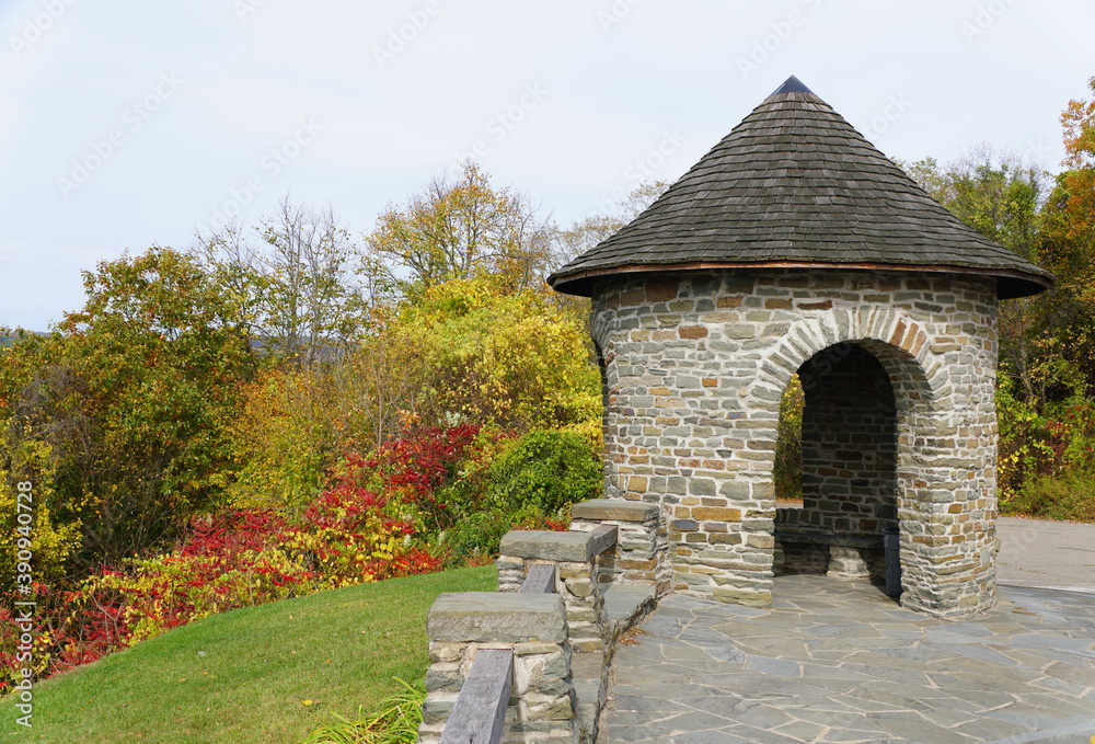 The brick lookout tower surrounded by fall foliage near Wyalusing, Pennsylvania, U.S The brick lookout tower surrounded by fall foliage near Wyalusing, Pennsylvania, U.S