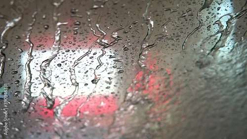 Touch Free Carwash Applies Spot Rinse Solution to a Windshield photo