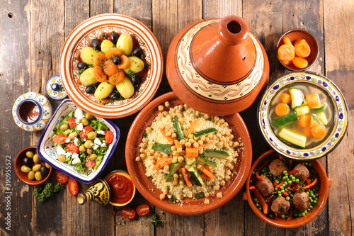 assorted of moroccan cuisine, couscous, tajine and salad photo