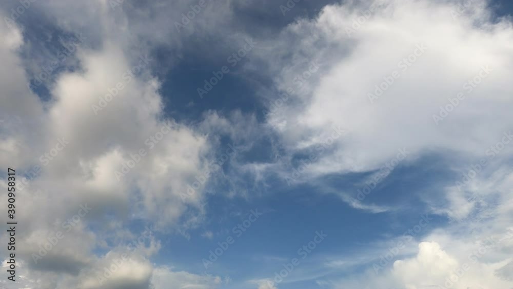 White puffy fluffy clouds & dramatic building motion cloudscape slowly moved on beautiful sunny blue sky background in tropical summer sunlight & sun rays at daylight sunshine day, 4k uhd TimeLapse White puffy fluffy clouds & dramatic building motion cloudscape slowly moved on beautiful sunny blue sky background in tropical summer sunlight & sun rays at daylight sunshine day, 4k uhd TimeLapse