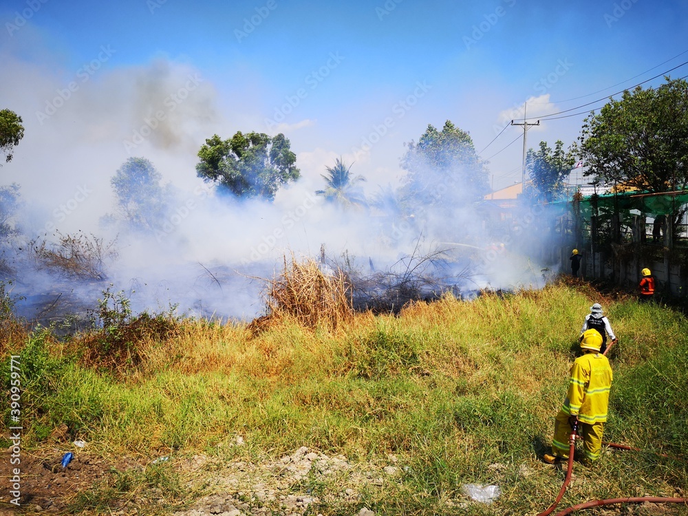 Fototapeta premium Dirty smoke caused by fire. Soaring in the sky