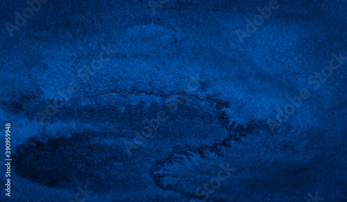 Rich dark blue watercolor background. Texture for creative design.