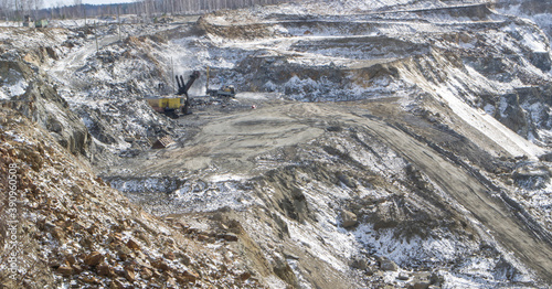 Graphite quarry. Open pit mining of graphite photo