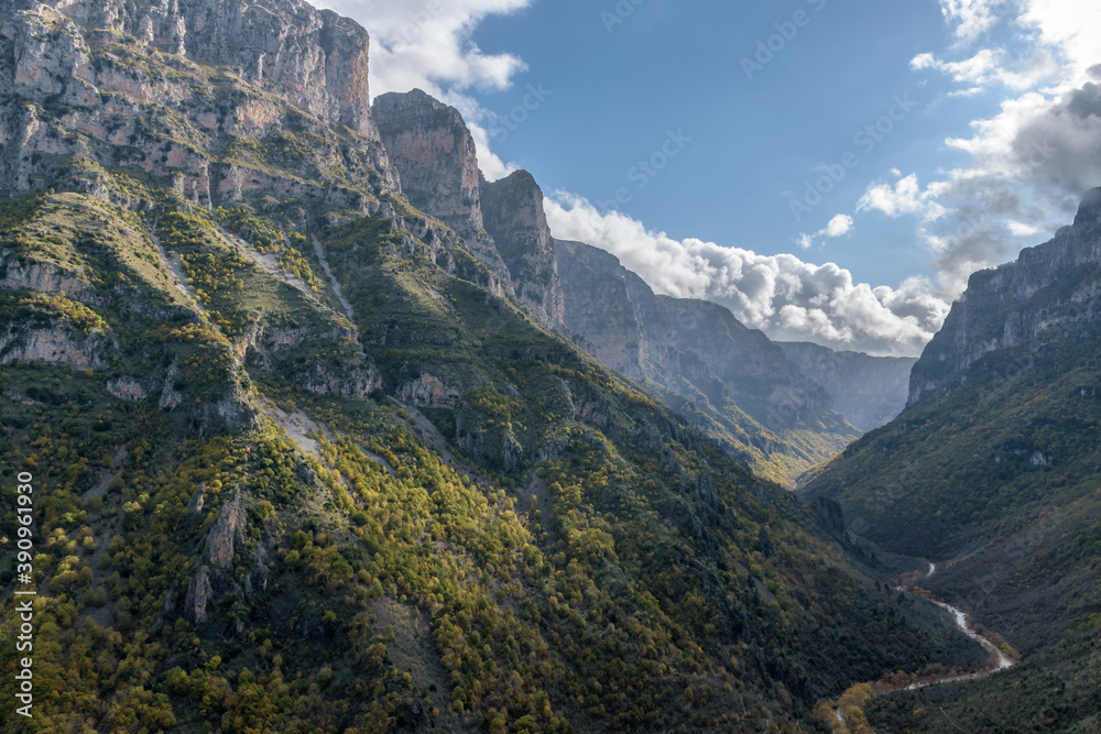 view of  Vikos Gorge, the deepest gorge in Europe, with fall colors near vikos village in Zagori Epirus, Greece.