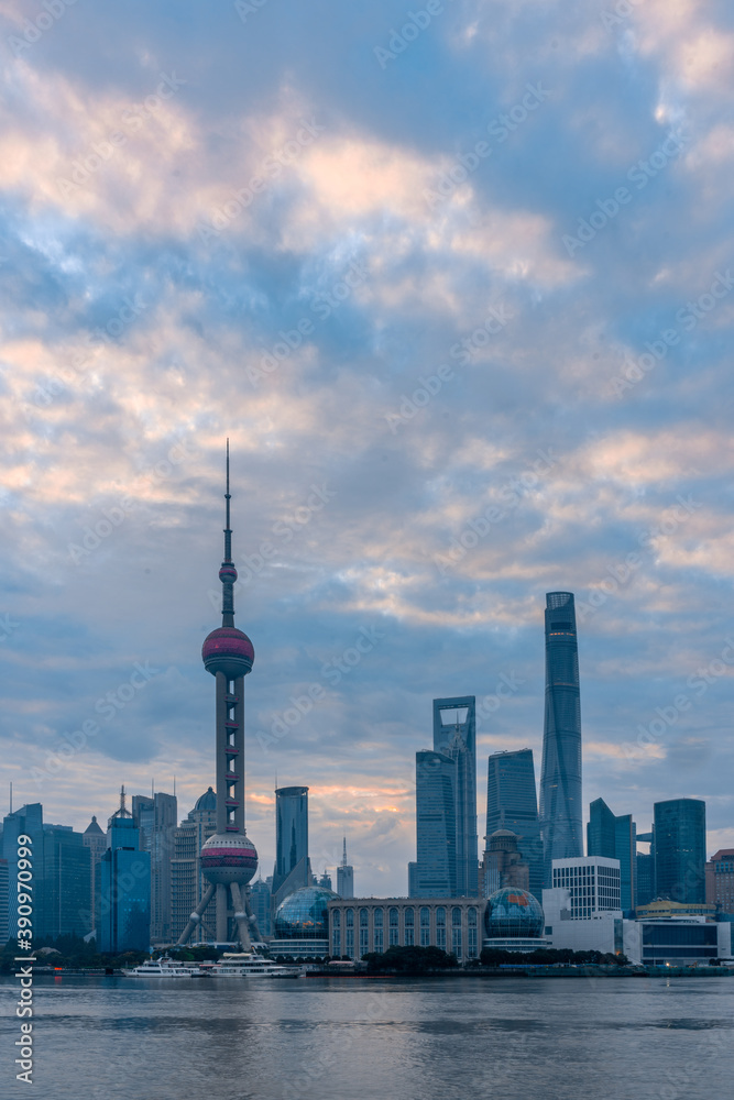 Sunrise view of Lujiazui, the financial district in Shanghai, China, on a cloudy day.