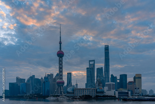 Sunrise view of Lujiazui, the financial district in Shanghai, China, on a cloudy day.