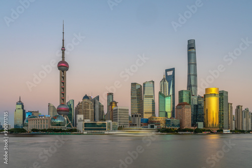 Sunset view of Lujiazui, the financial district in Shanghai, China. © Zimu