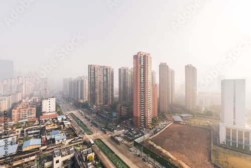 Wuhan cityscapes after the covid-19, aerial view city buildings and skyline in a foggy morning