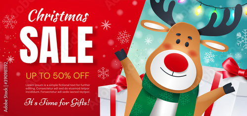 Reindeer with gifts announces holiday discounts. Christmas sale time for gifts.
