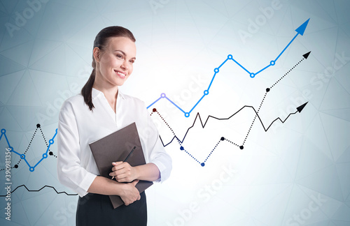 Woman with folder and growing graph