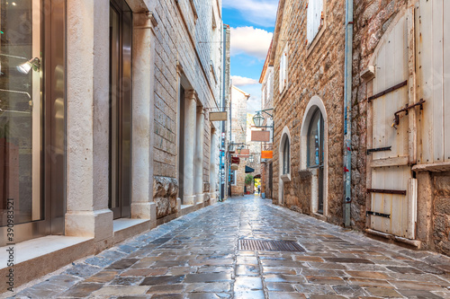 Narrow adriatic street in the Old Town Of Budva, Montenegro © AlexAnton