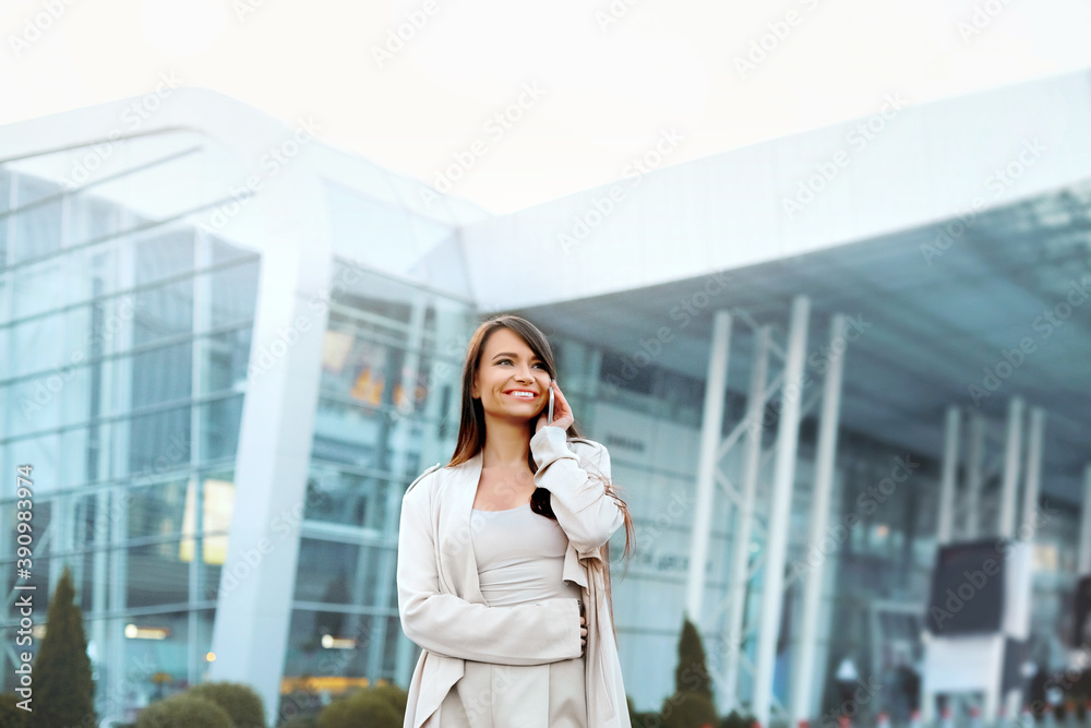 Beautiful Business women talking by smartphone at street. Girl have conversation speaking by mobile Beautiful Business women talking by smartphone at street. Girl have conversation speaking by mobile