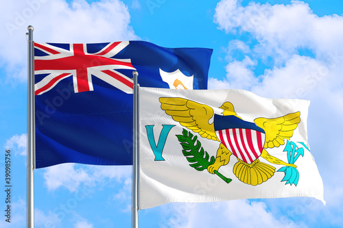 United States Virgin Islands and Anguilla national flag waving in the windy deep blue sky. Diplomacy and international relations concept. photo