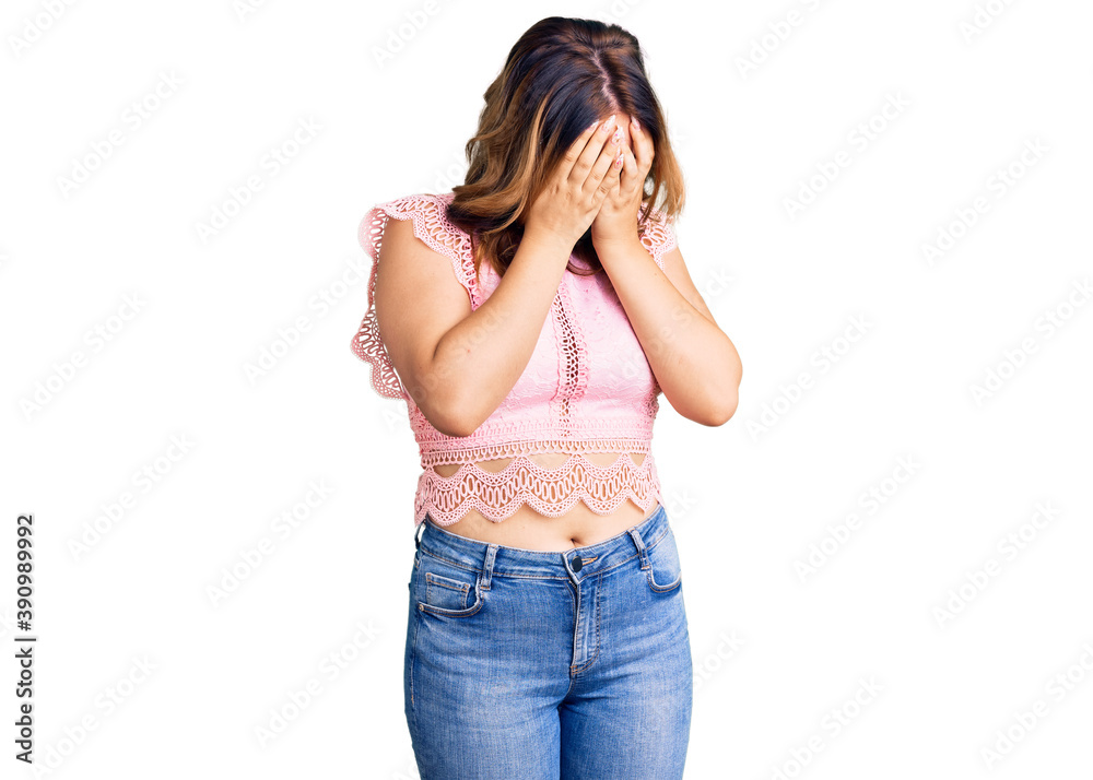 Young beautiful caucasian woman wearing casual clothes with sad expression covering face with hands while crying. depression concept.
