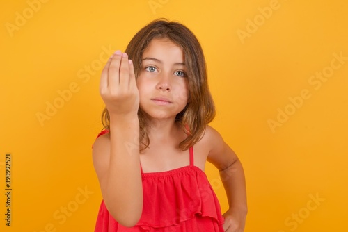What the hell are you talking about. Shot of frustrated Caucasian young girl gesturing with raised hand doing Italian gesture, frowning, being displeased and confused with dumb question.