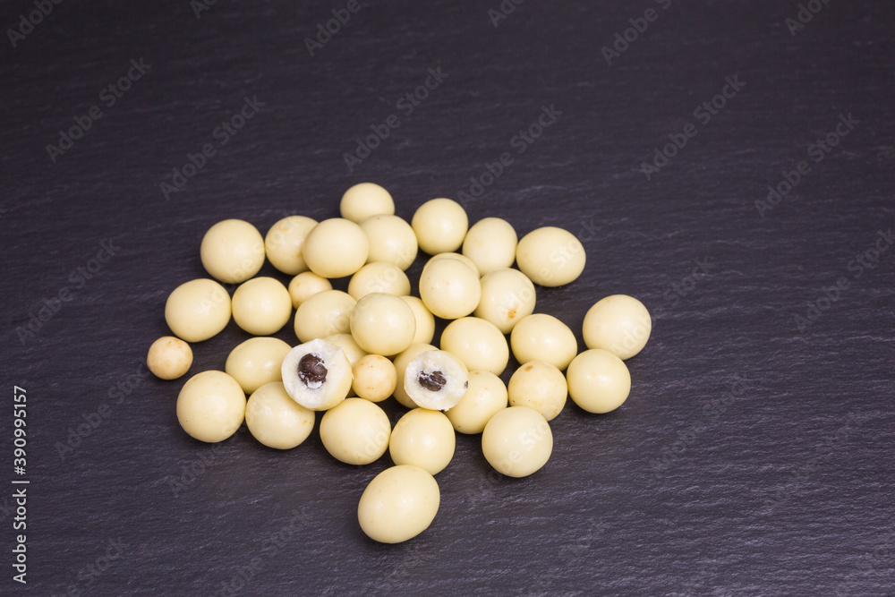 heap of white chocolate balls with coffee beans