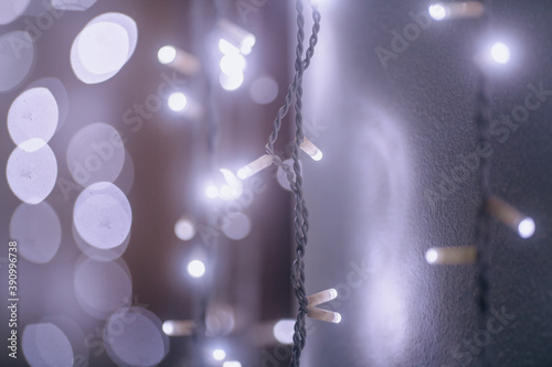 Christmas garland, selective focus. Christmas lights, street decoration