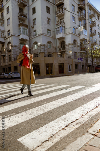 Mature pale hair stylish woman lifestyle portrait outdoors in city © Yaroslav Astakhov