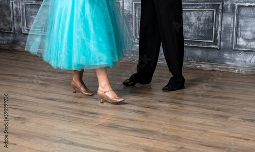 beautiful female dancer legs in golden dance shoes