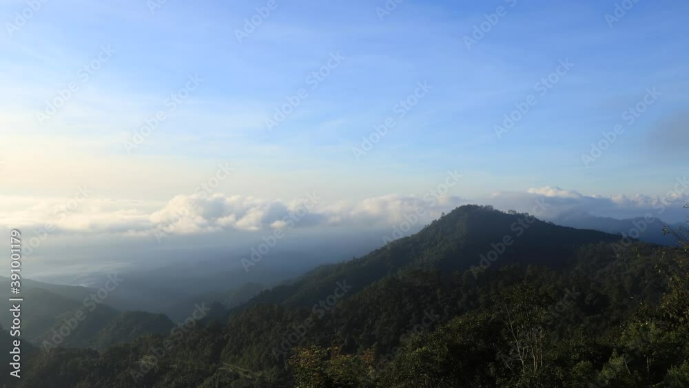 Beautiful nature landscape of forest mountain and clouds blue sky with time lapse Beautiful nature landscape of forest mountain and clouds blue sky with time lapse