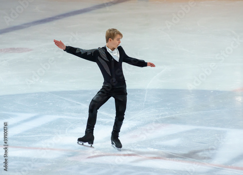 Photography young man figure skating ,competition , france .
