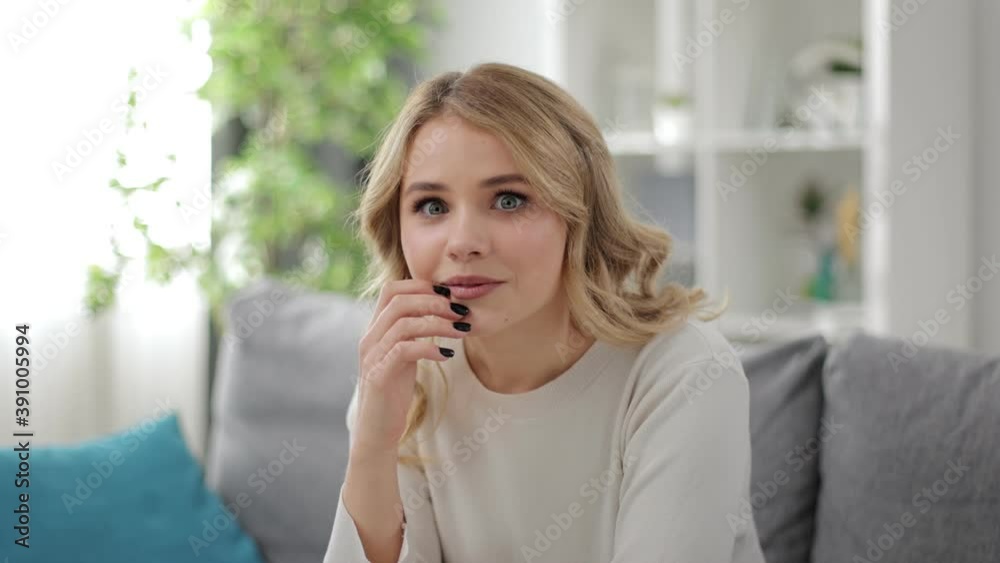 Attractive young woman found solution after long thinkings on couch. Real human emotions. Attractive young woman found solution after long thinkings on couch. Real human emotions.