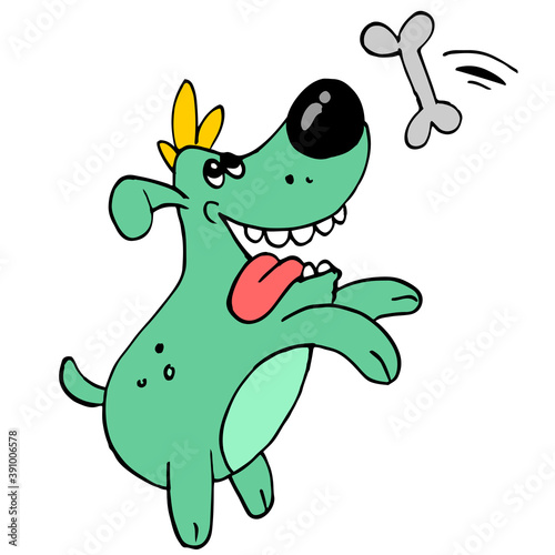 the dog is jumping wanting to catch the bone