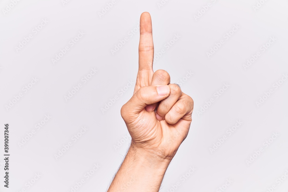 Close up of hand of young caucasian man over isolated background counting number one using index finger, showing idea and understanding Close up of hand of young caucasian man over isolated background counting number one using index finger, showing idea and understanding