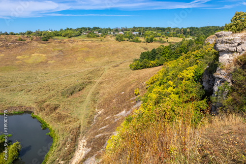 View of the river Vorgol and the surrounding landscape from the top of the cliffs. Tourist and rock climbing place near the city of Yelets, Lipetsk region, Russia