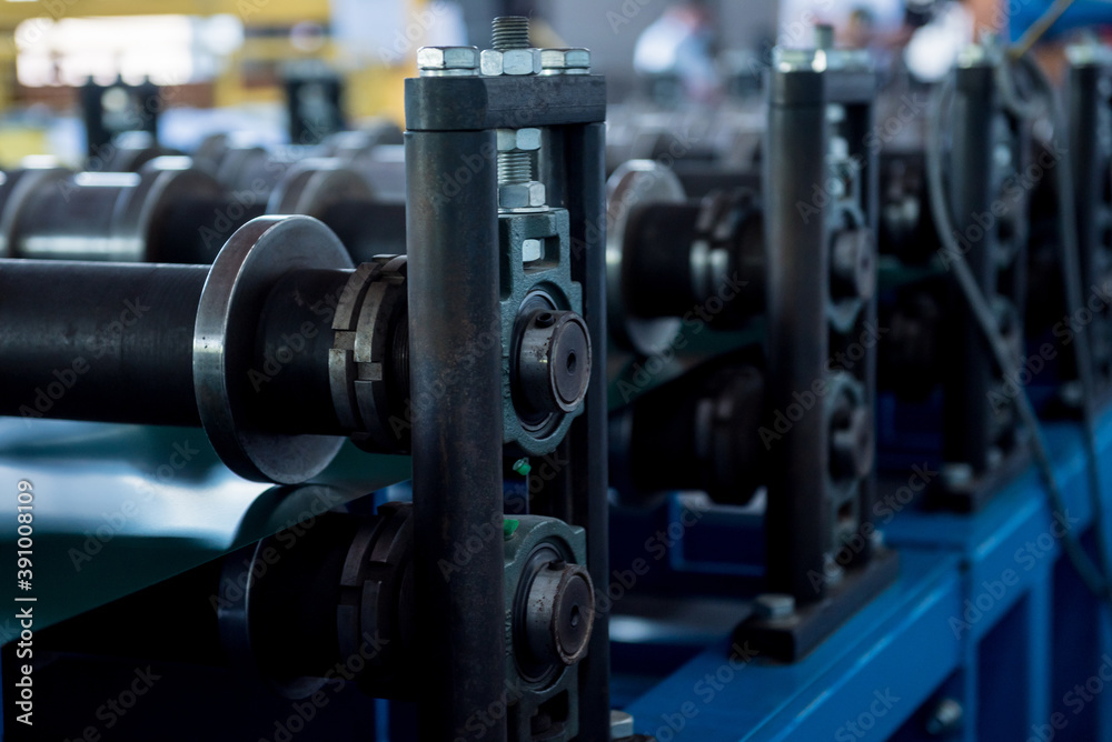 Metal sheet forming machine at the modern metalwork factory. Metal sheet forming machine at the modern metalwork factory.