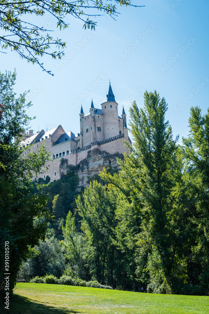 Low angle view of the Alcazar, a stone castle-palace located in the walled old city of Segovia, Spain.