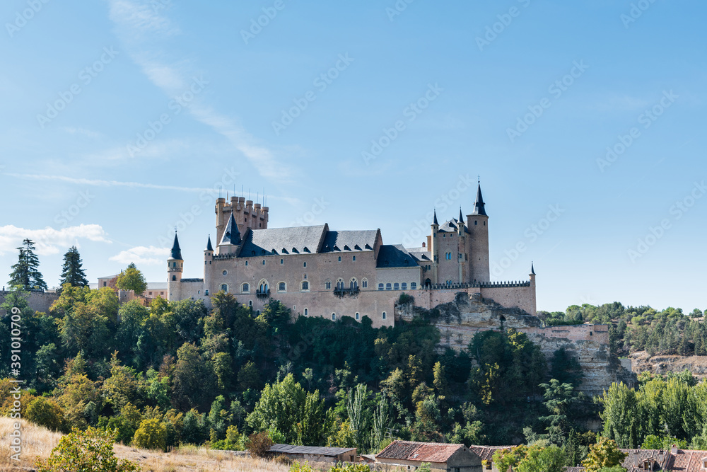 Low angle view of the Alcazar, a stone castle-palace located in the walled old city of Segovia, Spain.