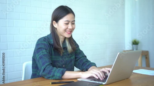 work from home using laptop computer technology small business owner freelance innovative skill independent planning thinking ideas working late at house living room