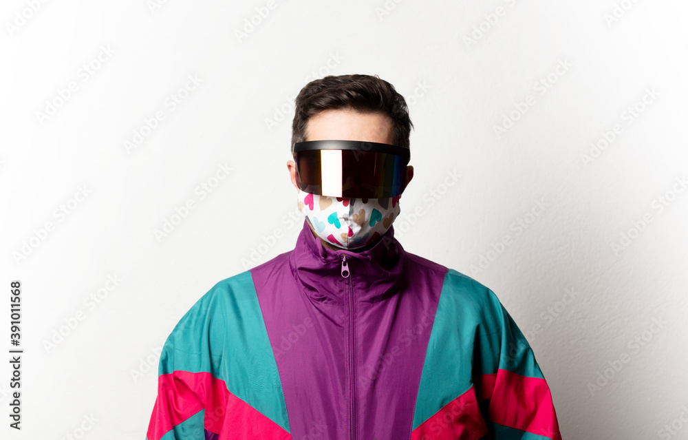 Style man in tracksuit and futuristic glasses on white background Style man in tracksuit and futuristic glasses on white background