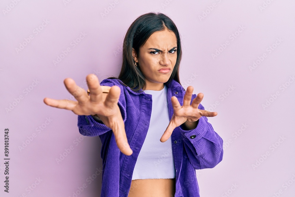 Young brunette woman wearing casual clothes doing stop gesture with hands palms, angry and frustration expression Young brunette woman wearing casual clothes doing stop gesture with hands palms, angry and frustration expression