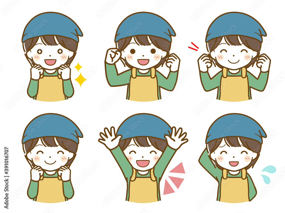 エプロンを着た男児の楽しい表情