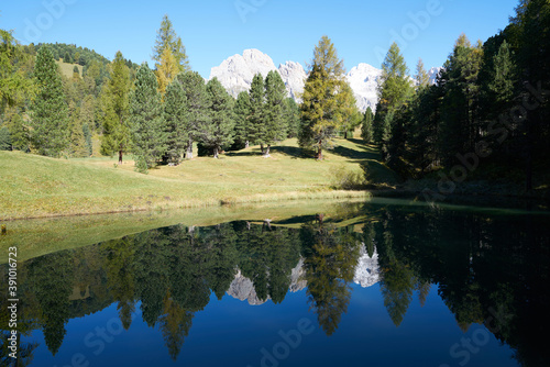 mountain lake in the dolomite mountains near wolkenstein and juac hut