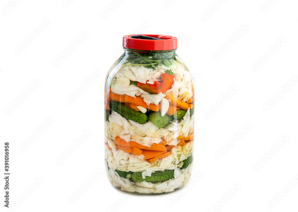 Homemade Mixed Pickles Inside A Jar, Isolated On White Surface Homemade Mixed Pickles Inside A Jar, Isolated On White Surface