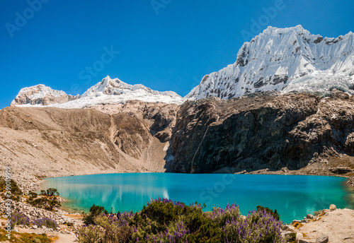 View of the turquoise waters of lake 69 inside of huascaran national park near the city of huaraz in Peru