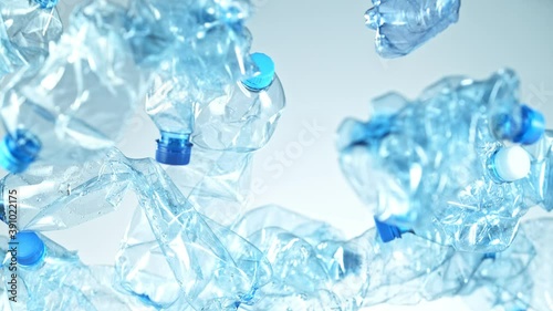 Wallpaper Mural Super Slow Motion Shot of Flying Empty Plastic Bottles on Light Grey Gradient Background at 1000fps. Torontodigital.ca